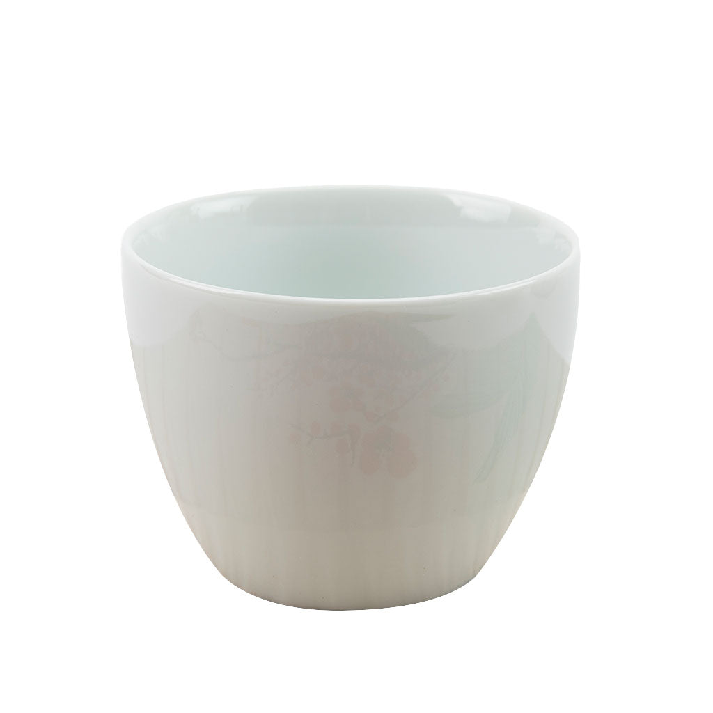 White ceramic cup on a white background