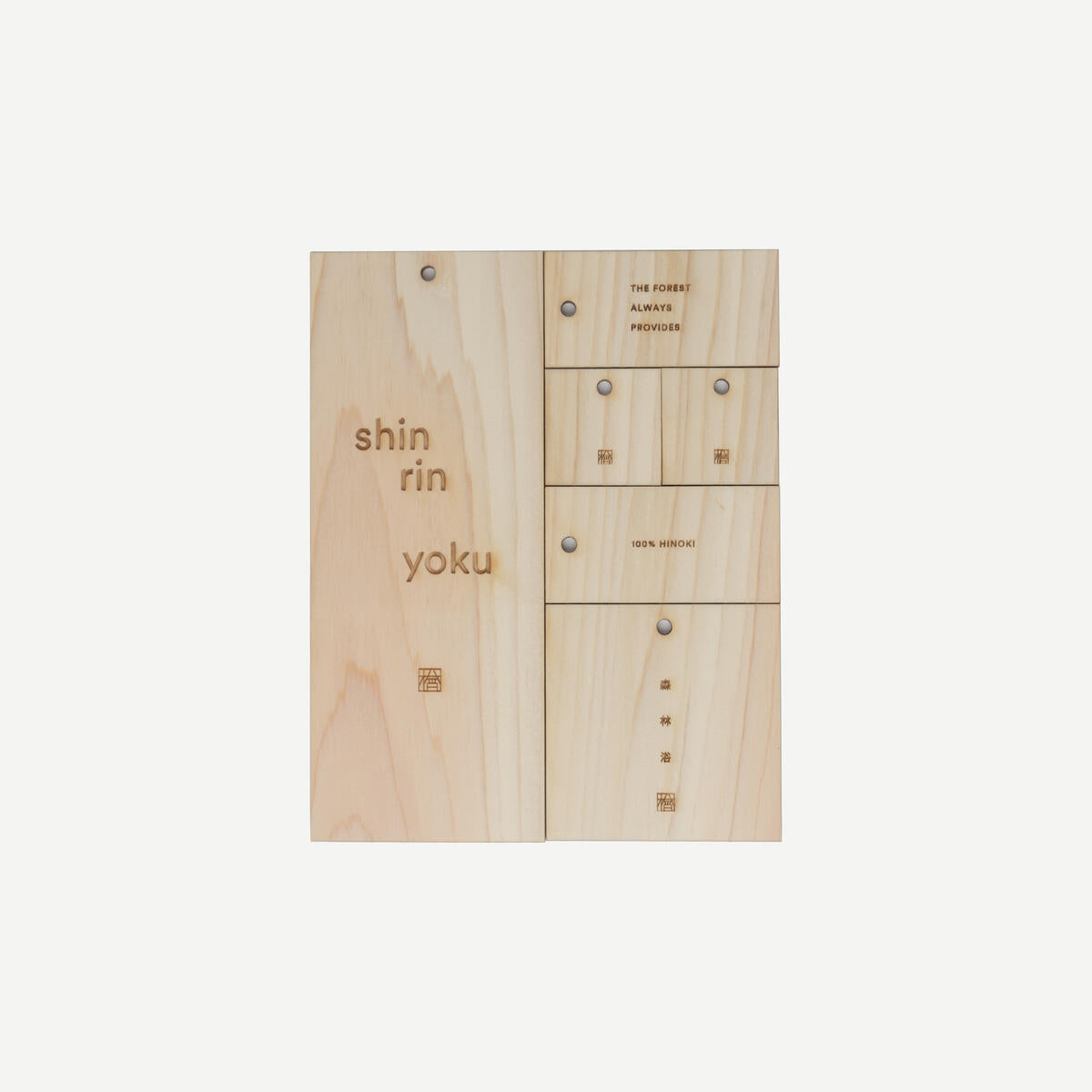Wooden panel with engraved text on a white background