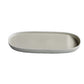 Rectangular ceramic plate on a light gray background