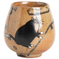 Brown teacup with a black painted cat on it.