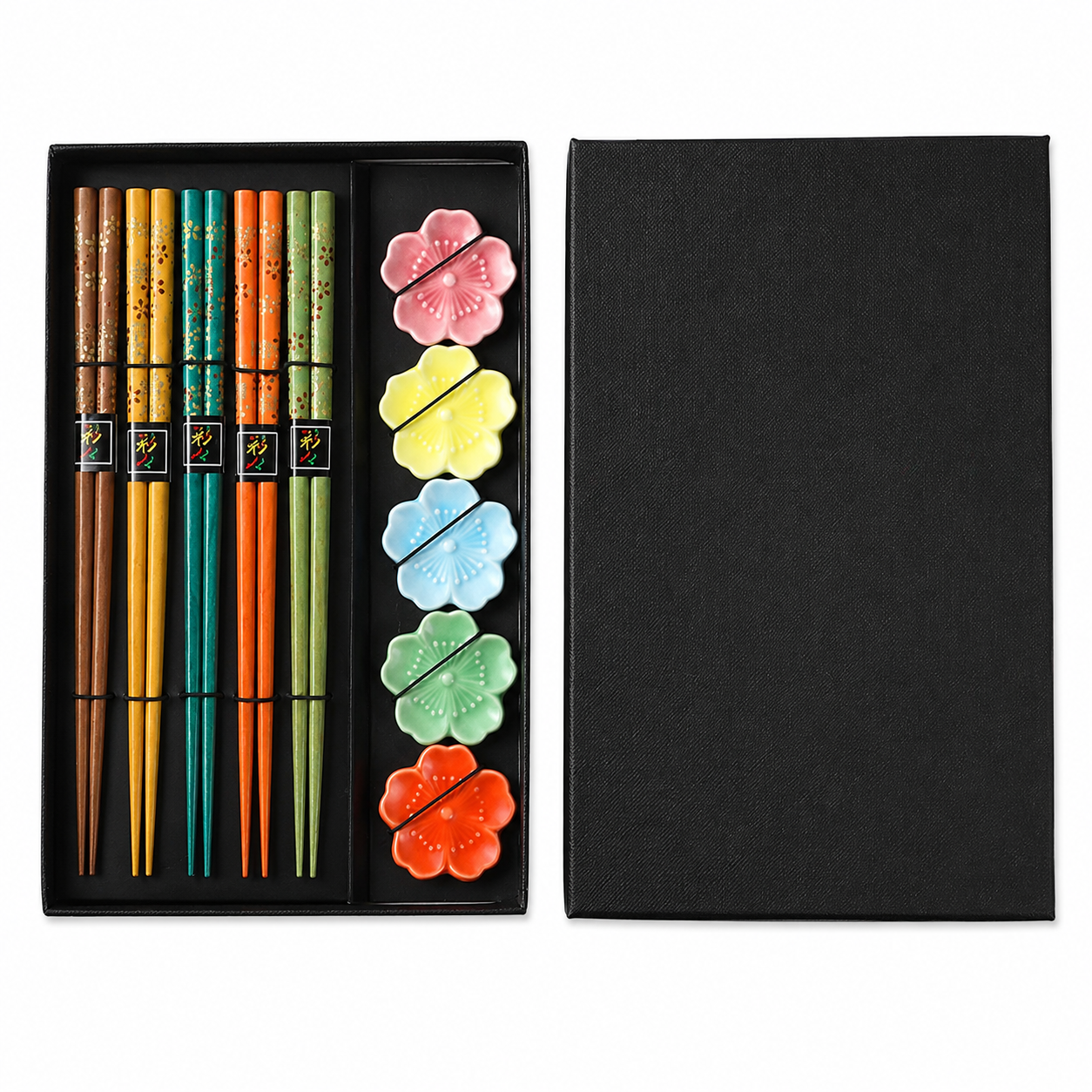 Black box of a color chopstick set with chopstick floral rests. 