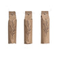 Three brown paper packages with leaf designs on a white background