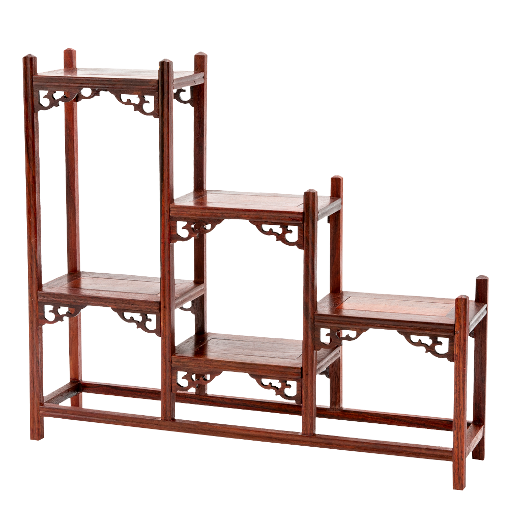 A traditional Japanese ornate rosewood shelf with scroll detailing and a stagnated 'step' design.