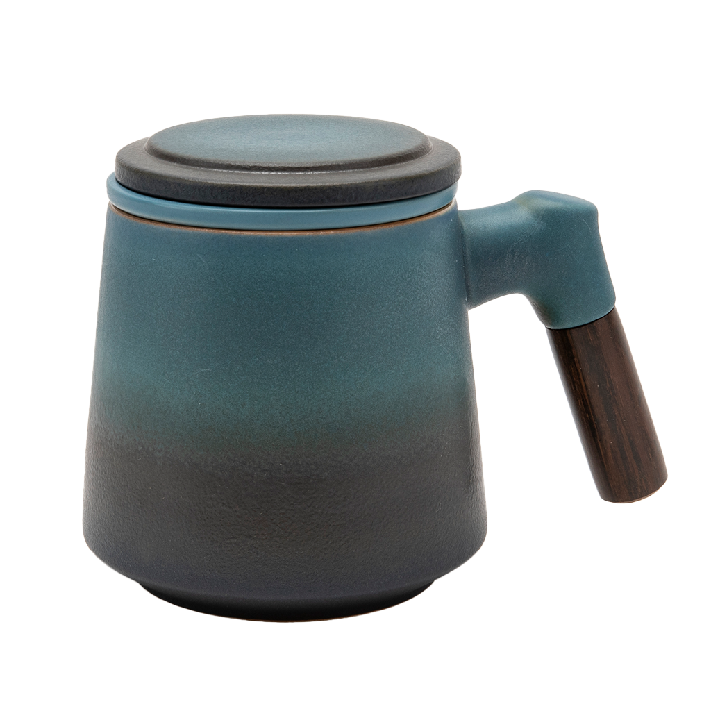 A blue ceramic tea infuser cup with a removable lid and a wooden handle.