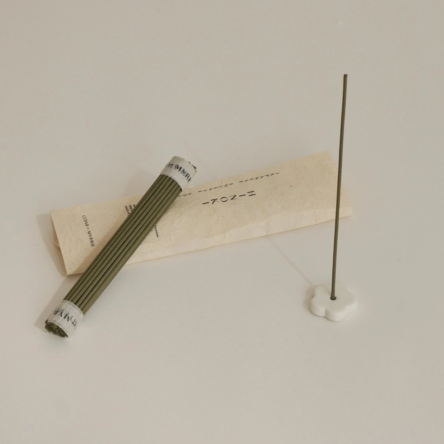 Incense stick and packaging on a light background