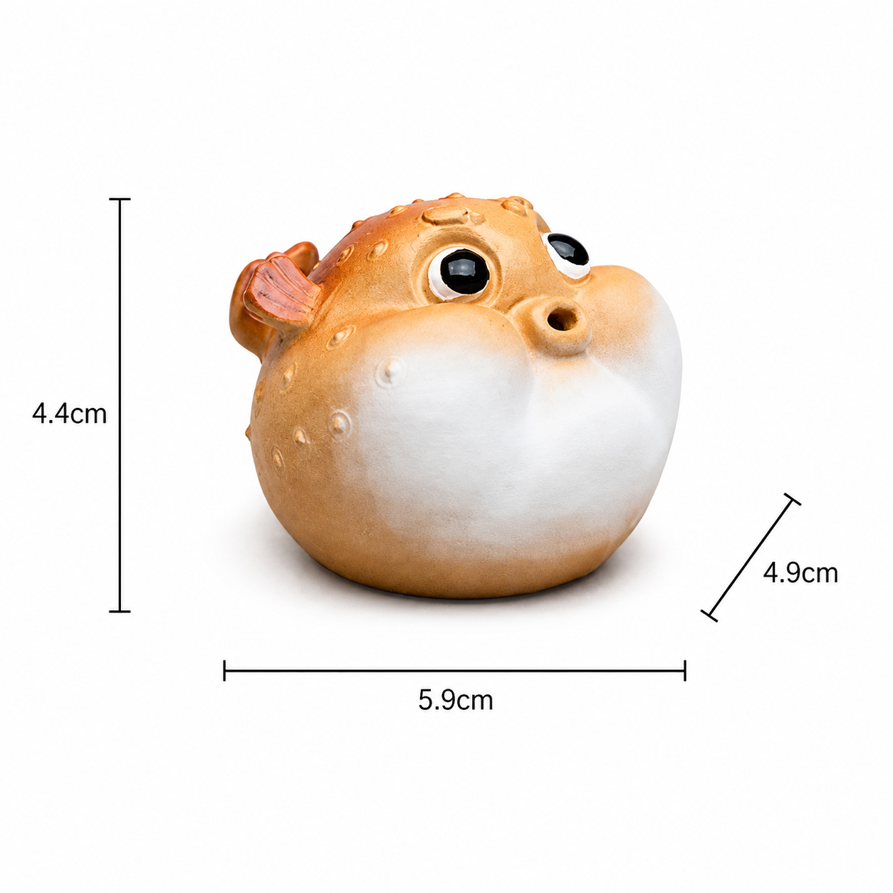 A puffer fish tea pet and incense holder on a white background with measurements.