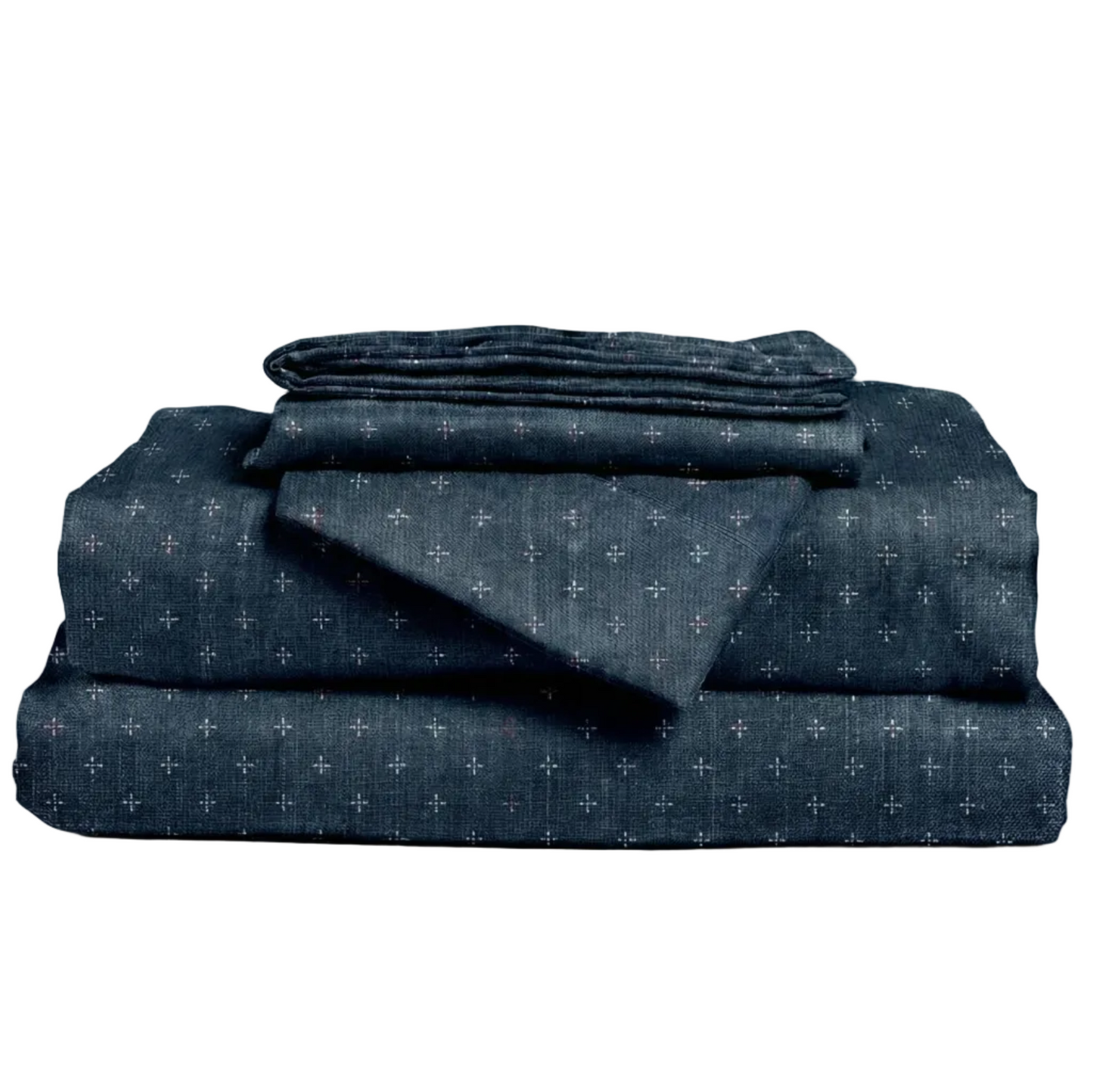 Set of dark blue patterned bedding on a white background