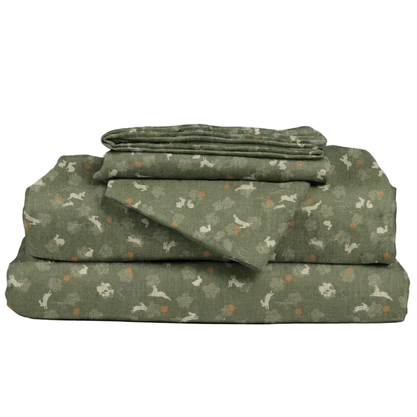 Set of green patterned bed sheets on a white background