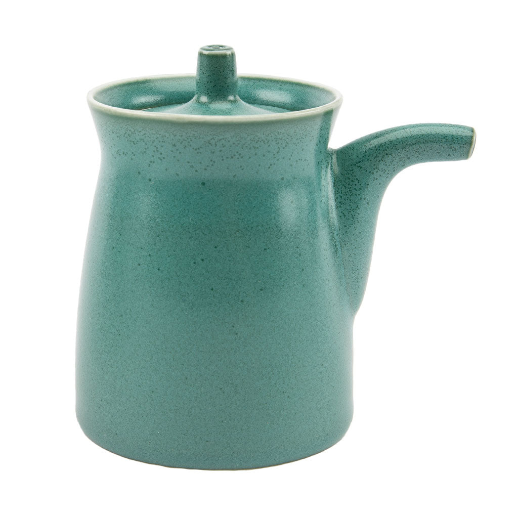 Teal ceramic soy sauce dispenser on a white background