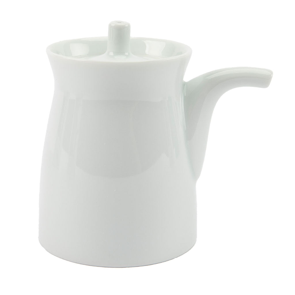 White ceramic soy sauce dispenser on a white background