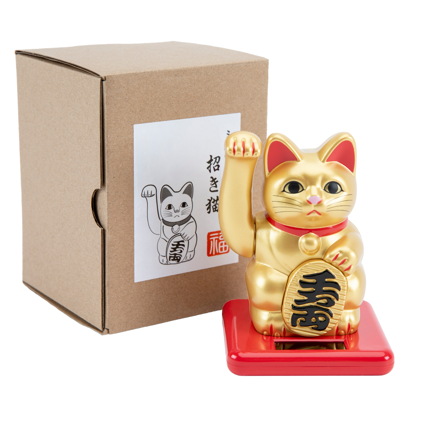 Maneki Neko in gold with a cardboard box behind it.