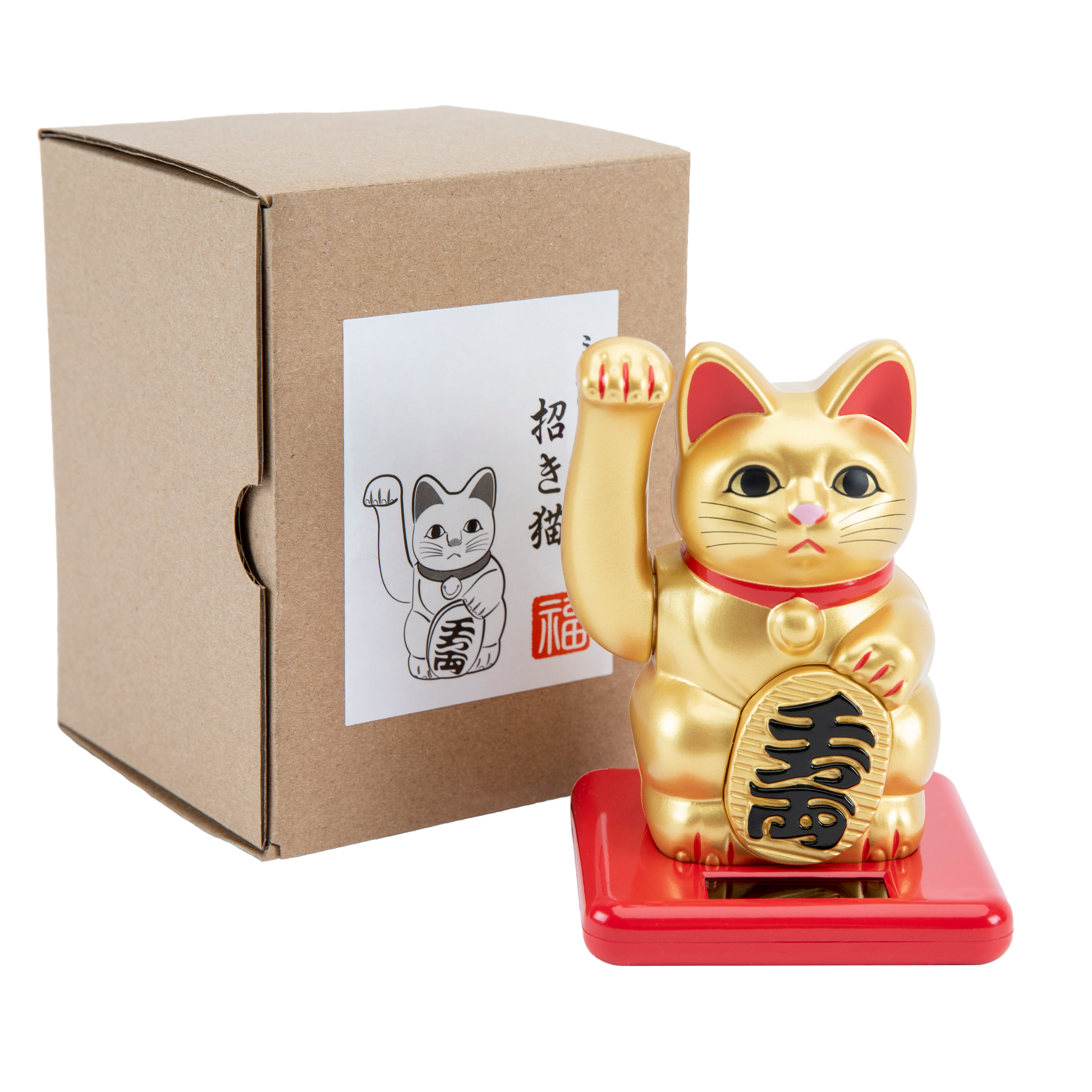 Maneki Neko in gold with a cardboard box behind it.