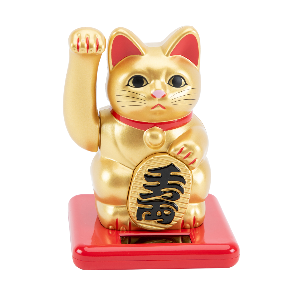 Gold maneki-neko cat on a red base with a white background