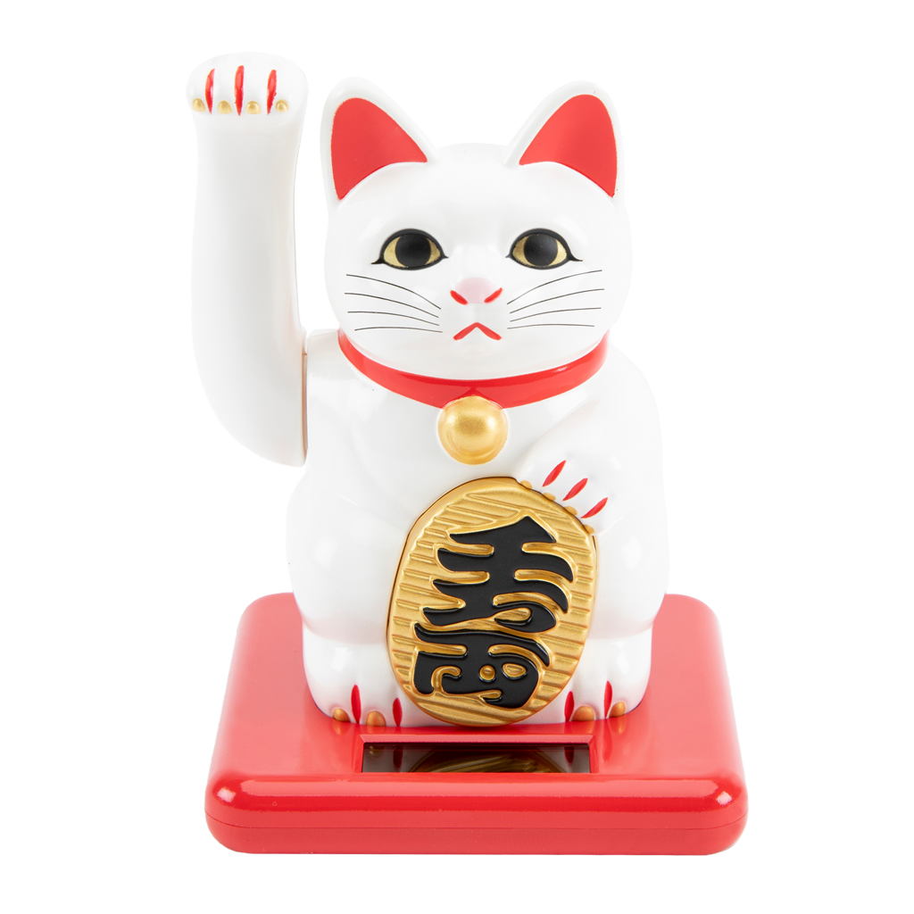 White cat figurine with red accents and gold emblem on a white background