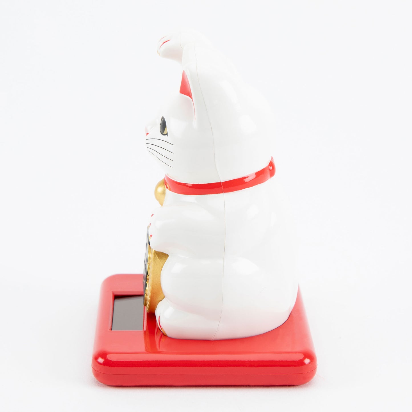White maneki-neko cat on a red base with a white background
