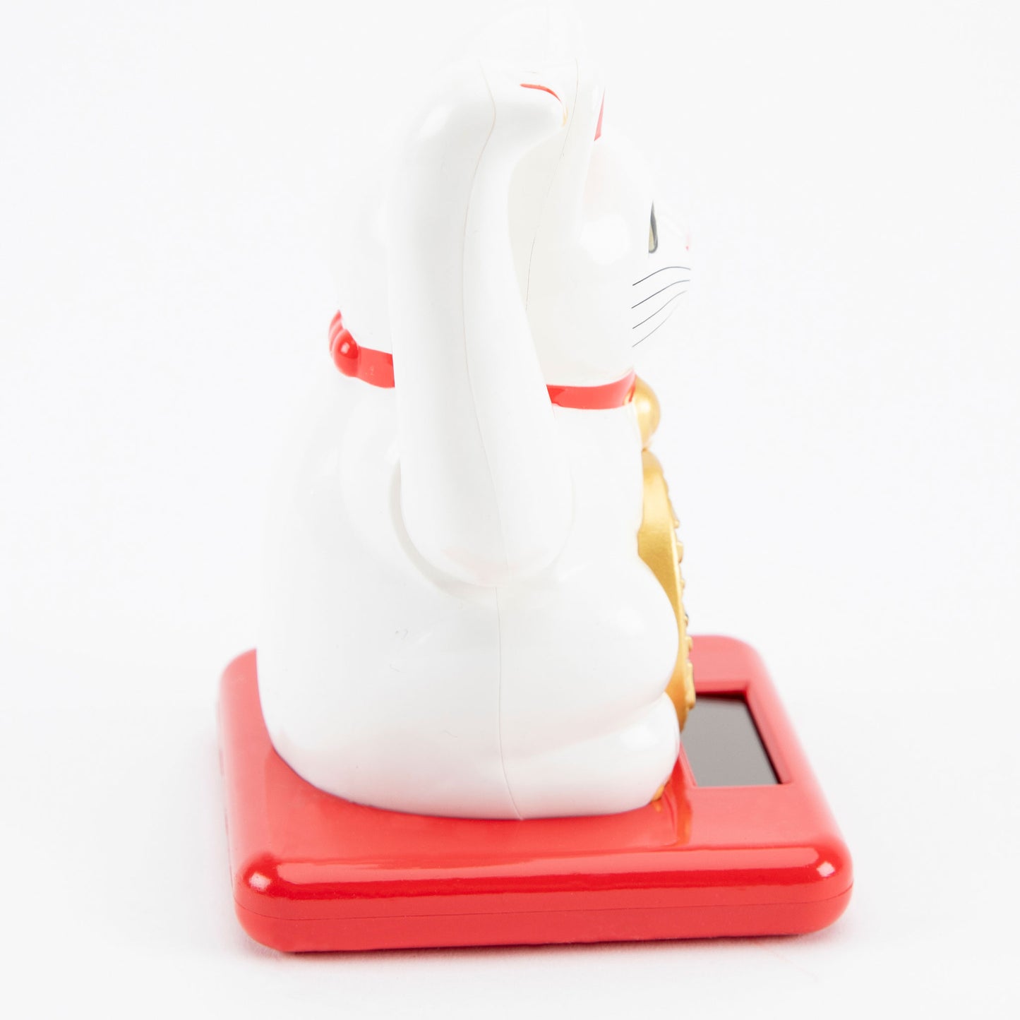 White maneki-neko cat on a red base with a white background