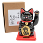 Black maneki-neko cat on a red base with a white background