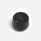 Black container with 'yoku' branding on a white background