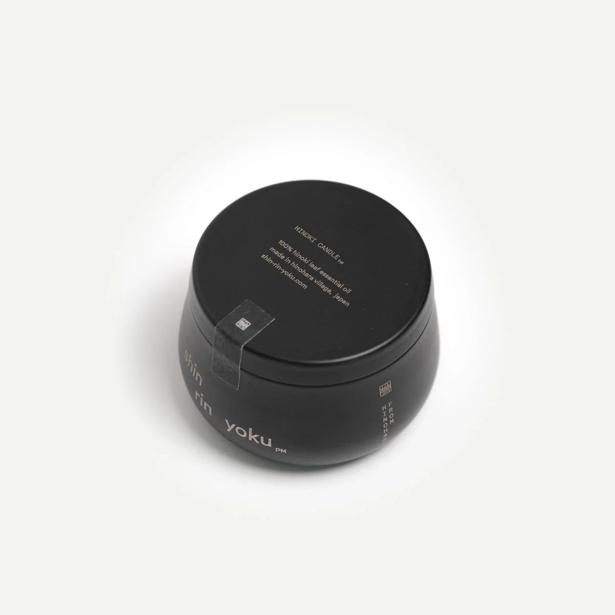 Black container with 'yoku' branding on a white background