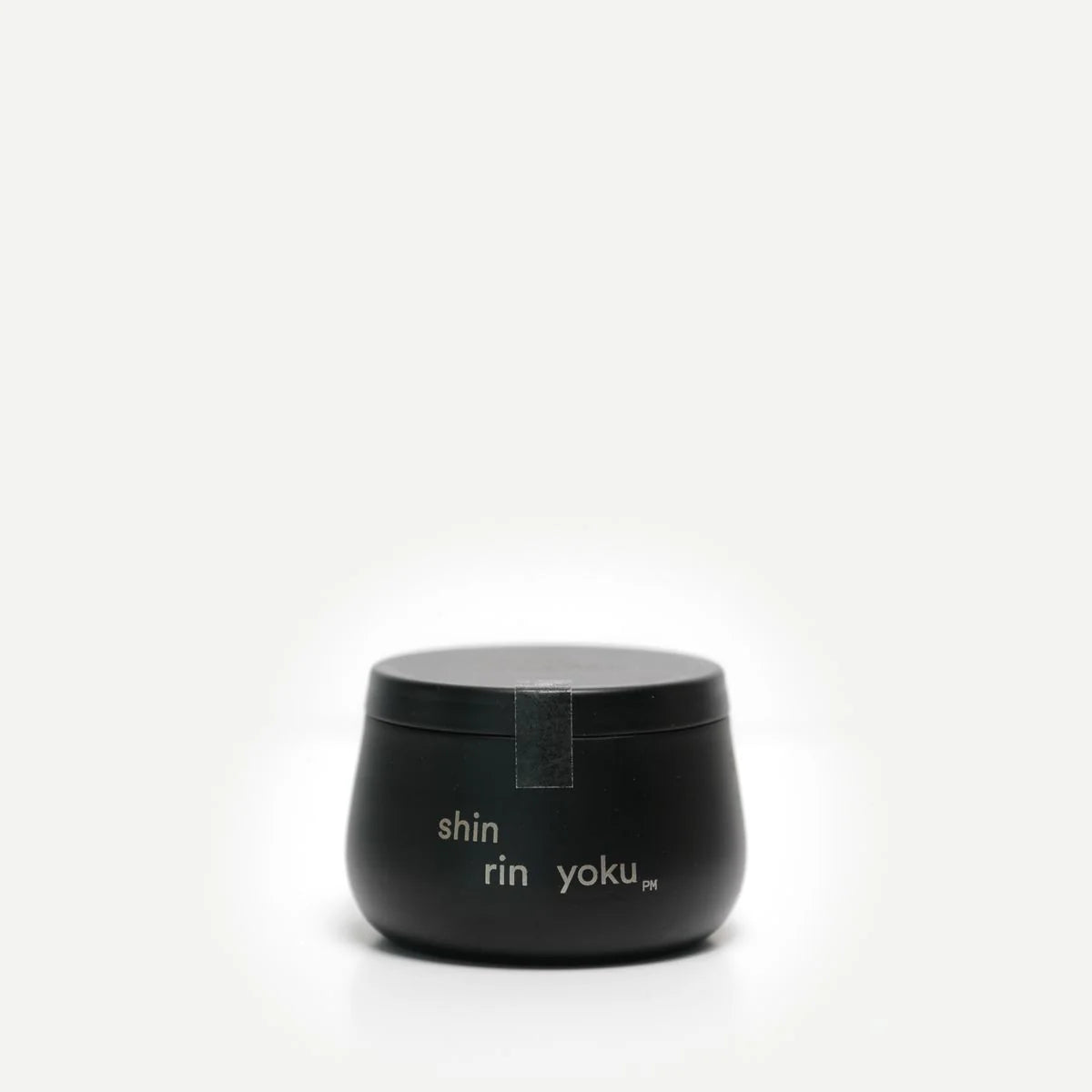 Black container with 'shin rin yoku' text on a white background